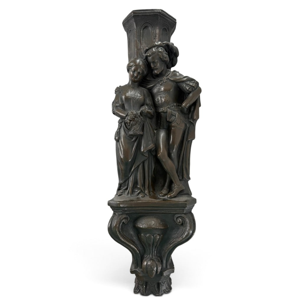 Continental Figural Composite Wall Bracket: Date: Late 19th century Origin: Continental Materials: Molded composition, painted finish, and metal hanging hardware Form: Figural wall bracket Description: A Continental Renaissance Revival wall