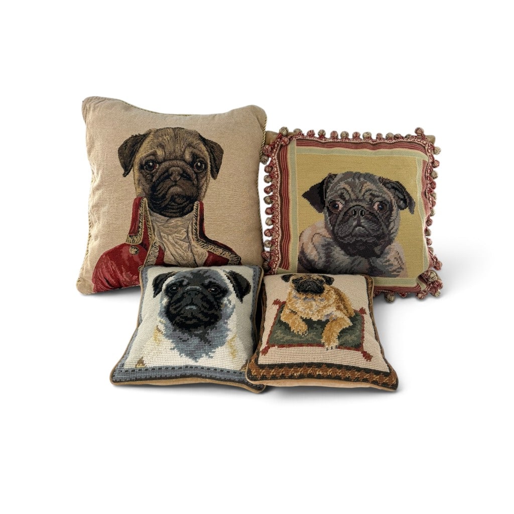 Group of Four Pug Needlepoint Pillows: Origin: Unidentified Date: Late 20th or early 21st century Period/Style: Animalier Decorative Materials: Needlepoint, tapestry fabric, textile backing, piping, fringe, and stuffed inserts Form: Group