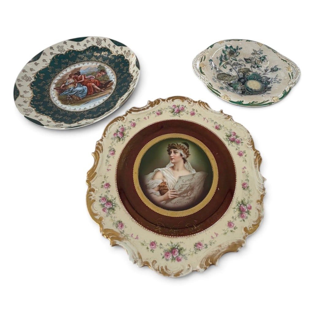 Three Victorian Ceramic Display Pieces: Origin: Austria and Continental Europe Date: Circa 1900 Period/Style: Victorian / Classical Revival Maker: Victoria Austria and unidentified makers Materials: Glazed porcelain and earthenware with tra