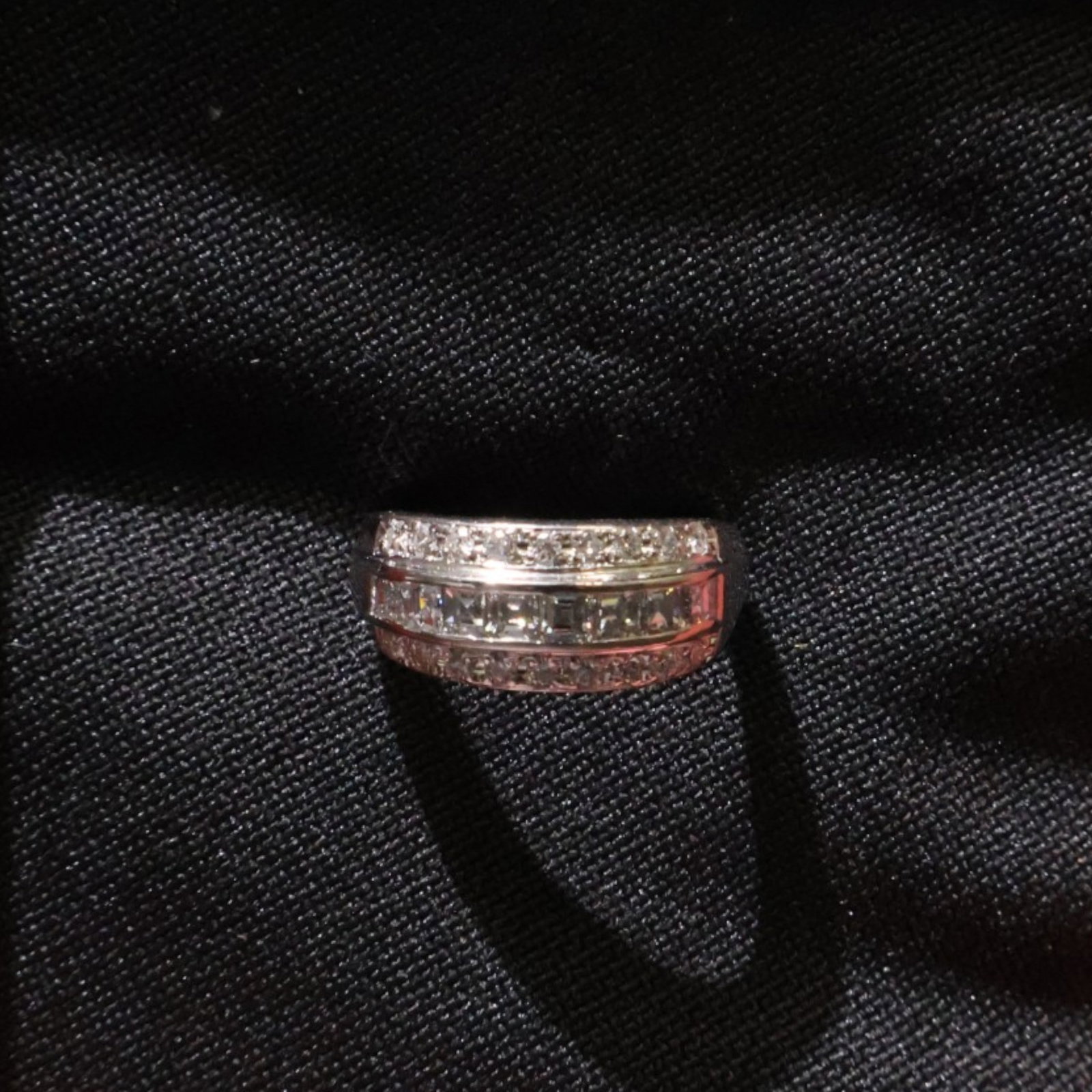 Platinum Asscher and Round Diamond Ring: Date: Late 20th to early 21st century Materials: Platinum and diamonds Form: Ring Description: A platinum ring combining Asscher-cut and round diamonds in a geometric setting. The consignor inventory