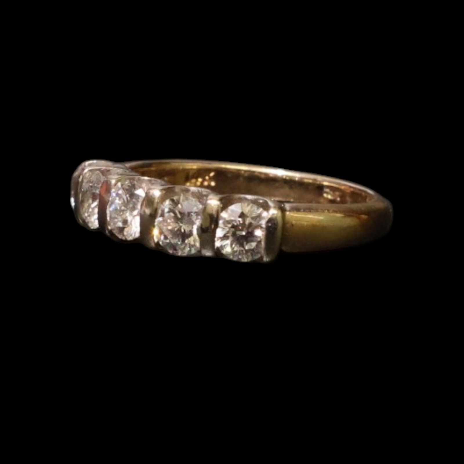 14K Leo 1.07 CTW Diamond Band: Date: Late 20th to early 21st century Materials: 14K yellow gold and diamonds Form: Band ring Description: A 14K yellow gold band set with Leo-branded diamonds across the top. The consignor inventory