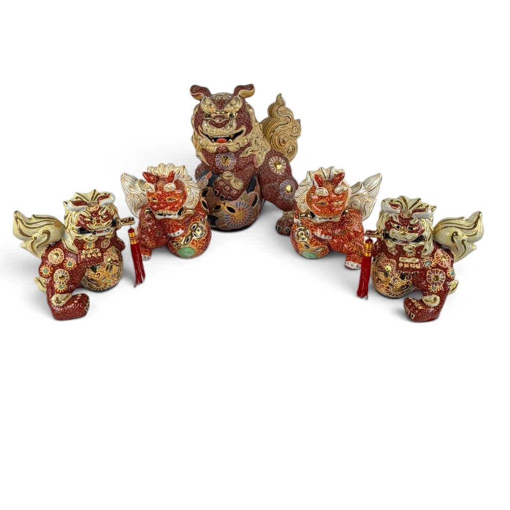 Five Japanese Kutani-Style Shishi Figures: Origin: Japan and China Date: Mid-to-late 20th century Period/Style: Kutani style Maker: Various, including TOYO Materials: Glazed porcelain with polychrome enamel, gilt decoration, and textile