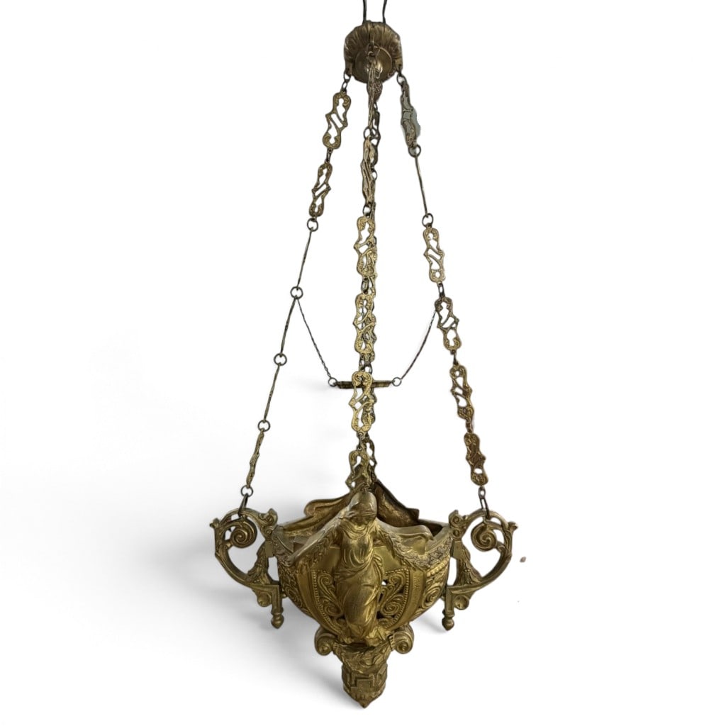 Continental Figural Brass Oil Lamp: Origin: Continental Europe Date: Circa 1870-1880 Period/Style: Late 19th century Maker: Unidentified Materials: Gilt brass and mixed metal Form: Hanging figural oil lamp