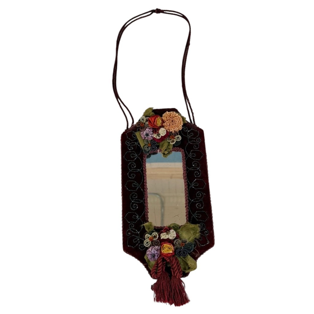 Victorian Velvet and Ribbonwork Wall Mirror: Origin: Probably American Date: Late 19th to early 20th century Period/Style: Victorian Maker: Unidentified Materials: Mirror glass, velvet, ribbonwork, metallic thread, and beads Fo