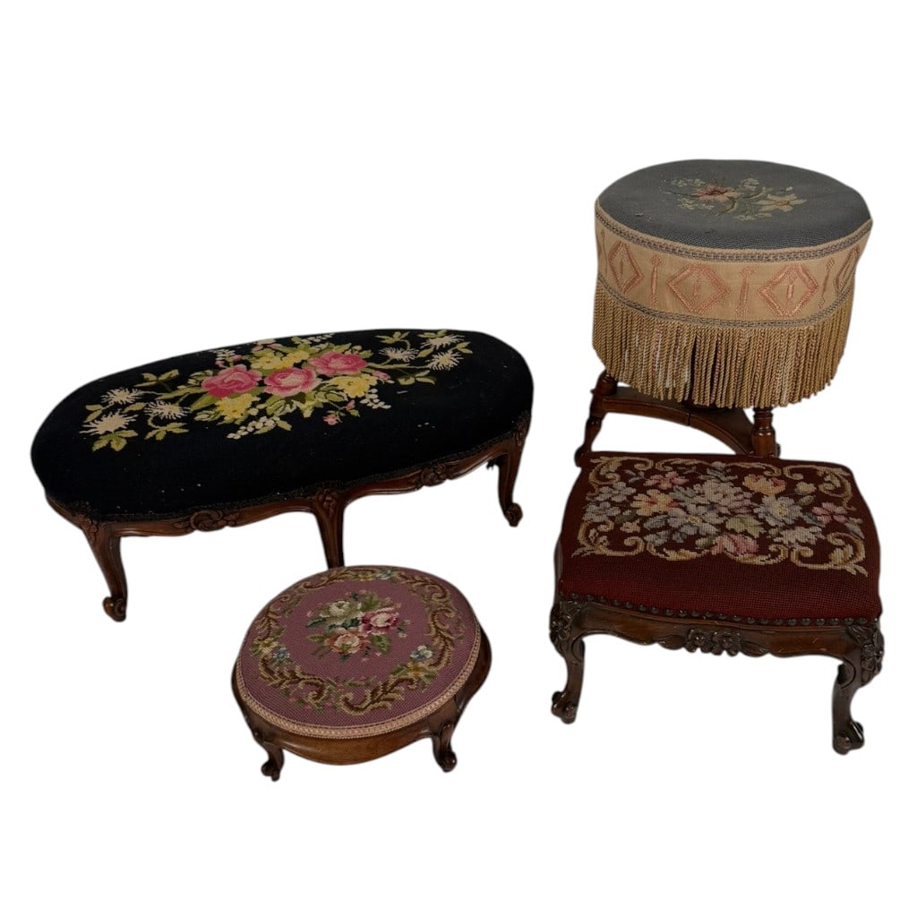 Four Needlepoint-Upholstered Stools: Origin: American and Continental Date: Late 19th to early 20th century Period/Style: Victorian Maker: Unidentified Materials: Mixed woods, needlepoint, textiles, and metal hardware Form: One piano or