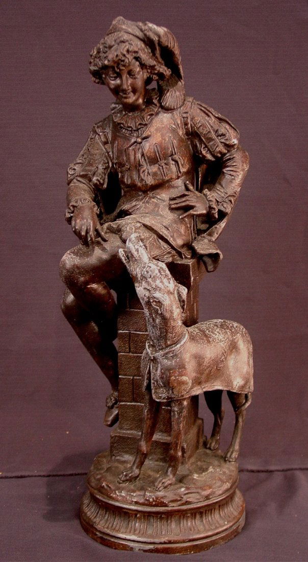 Metal statue of Frenchman with dog, 20in. T.: Metal statue of Frenchman with dog, 20in. T.