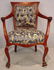 532: Mahogany empire arm parlor chair with lion head on