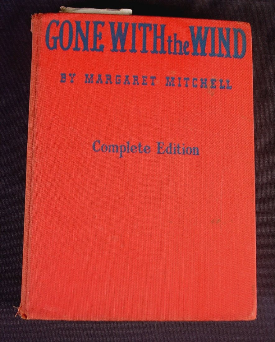 329: 1940 Motion picture edition of Gone with the Wind: 1940 Motion picture edition of Gone with the Wind with color illustration and clippings of Margaret Mitchells death.
