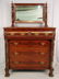 68: Mahogany empire chest with mirror with acanthus