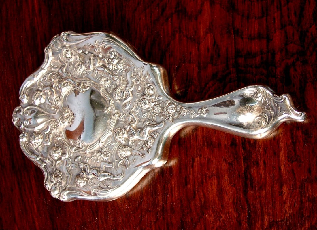 324: Silver plate ornate dresser mirror: Silver plate ornate dresser mirror