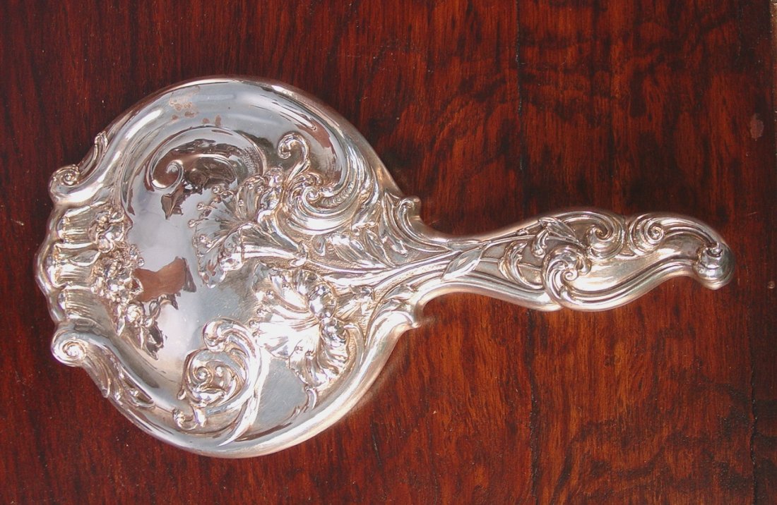 327: Silver plate ornate dresser mirror: Silver plate ornate dresser mirror