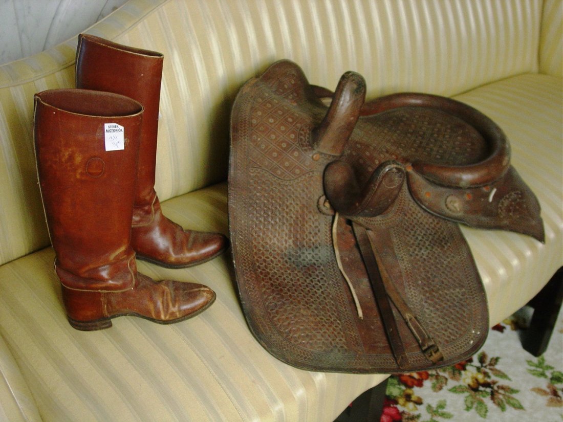 Leather saddle and boots.: Leather saddle and boots.