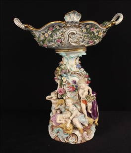 Meissen porcelain centerpiece: Meissen porcelain figural flower centerpiece, ca. 1880, small hairline crack professionally repaired, 17 in. T, 15 in. W, purchased at Christies March 2006 as lot 142