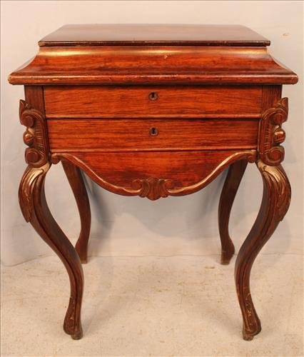 Rosewood rococo sewing stand by Belter: Rosewood rococo sewing stand, original finish, att. to Belter, 31.5 in. T, 24 in. W, 18 in. D.
