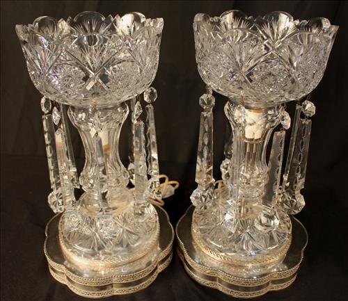 Pair brilliant cut mantle lusters on silver-plate: Pair of brilliant cut mantle luster on silver-plate base, 14 in. T, 7 in. W.