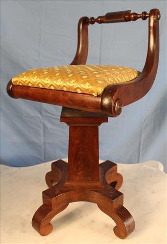 Period Empire piano chair: Period Empire piano chair in good condition, 27 in. T, 15 in. W, 12 in. D.