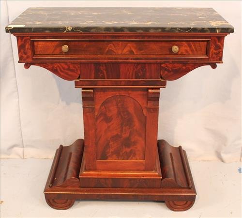 High style period mahogany mint julep cabinet: High style period mahogany mint julep cabinet with black and gold marble, 38.5 in. T, 35.5 in. W, 17 in. D.