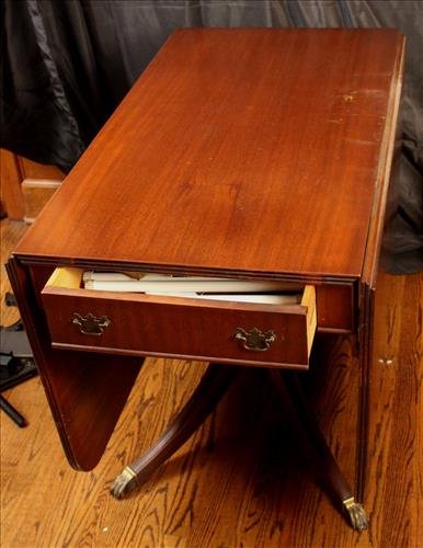 Duncan phyfe drop leaf dining table with drawer: Duncan phyfe drop leaf dining table with drawer, 3 ft. 4 in. W, 30 in. T, 5 ft. 6 in. L. with leaves up.