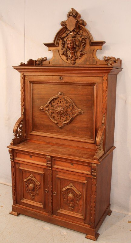 Rococo drop front secretary with carved head in crest (1 of 6)