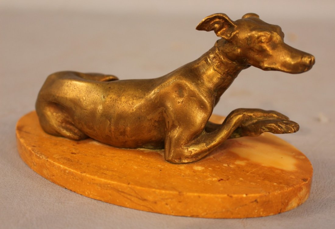 Whippet gilt bronze on oval marble base, 3 in. T.: Whippet gilt bronze on oval marble base, 3 in. T, 6.5 in. W.