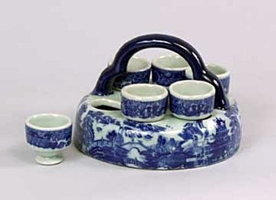 Egg cups with holder (20148): Porcelain, Transferware Dimensions : 5.00H 7.25W 7.25D