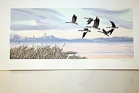 "Homecoming" By Artist Bloom.(BO): Hand Signed Serigraph By artist John Bloom. Born in De Witt, Iowa, John Bloom would become a prominent figure among the Eastern Iowa Art community. Bloom moved to Davenport where he attended St. Ambro