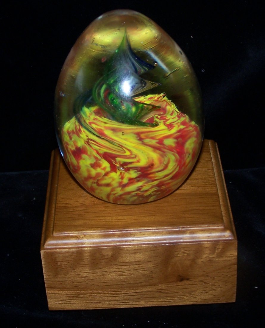 Beautiful Egg Shaped Paperweight with Electrified Up: This is a beautiful Egg Shaped Paperweight that is made even more beautiful when set on the electrified up light base.