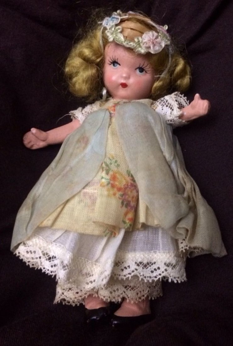 Rare 1938 Nancy Ann Little Bo Peep Storybook Doll.: Rare 1938 Nancy Ann, Little Bo Peep, Storybook doll. This doll from the Nancy Ann storybook series was made by NASB. She is 5-1.2" tall and is made of bisque with jointed arms and legs. She also has m