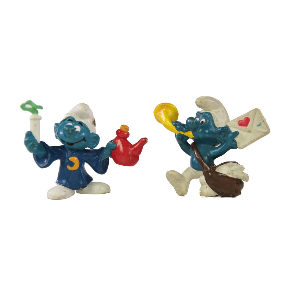 Pair of 2" 1978 Smurfs Figures(Fair): Pair of vintage 1978 2 inch Smurfs.Background:The Smurfs is a Belgian comic and television franchise centered