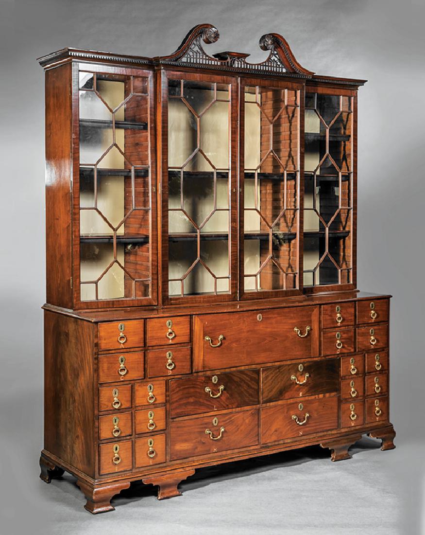 English Mahogany Breakfront Secretary Bookcase: English Mahogany Breakfront Secretary Bookcase, late 18th/early 19th c., after a Thomas Chippendale design, swan's neck crest, dentil molded cornice, four glazed doors enclosing adjustable shelves, ba