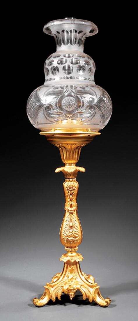 American Gilt Bronze Solar Lamp, Hooper or Dietz: American Gilt Bronze Solar Lamp, c. 1850, Hooper or Dietz, rococo baluster form standard with relief floral and vintage designs, double gourd shade with rosettes, h. 30 1/2 in. Provenance: The Service