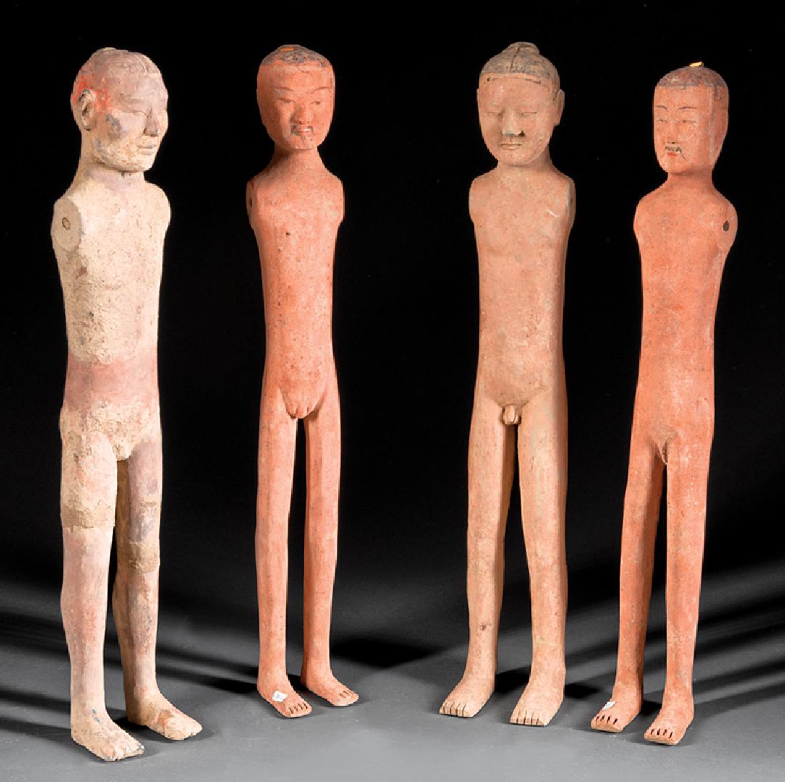 Group of Four Chinese Painted Pottery Attendants: Group of Four Chinese Painted Pottery Attendants, probably Han Dynasty (206 BCE - 220 CE), h. 22 3/8 in. to 23 1/8 in., 4 acrylic stands, tallest overall h. 24 3/4 in