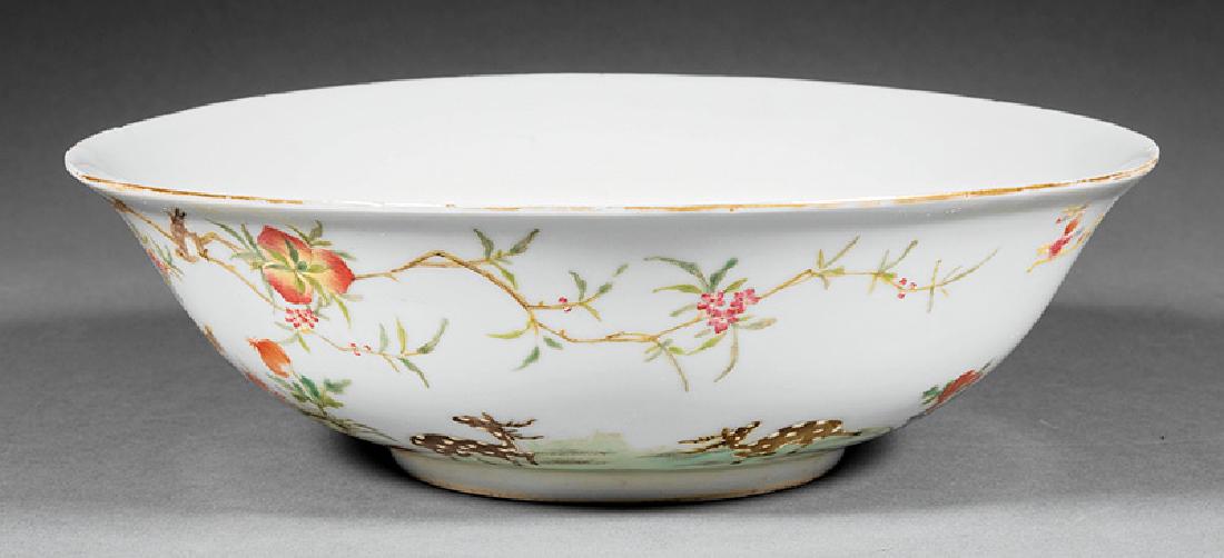 Chinese Famille Rose Porcelain Bowl: Chinese Famille Rose Porcelain Bowl, probably 20th c., interior decorated with floral sprays, exterior with spotted deer, peaches, flowers, and lingzhi, base with Jiaqing mark, h. 2 7/8 in., dia. 9 1/