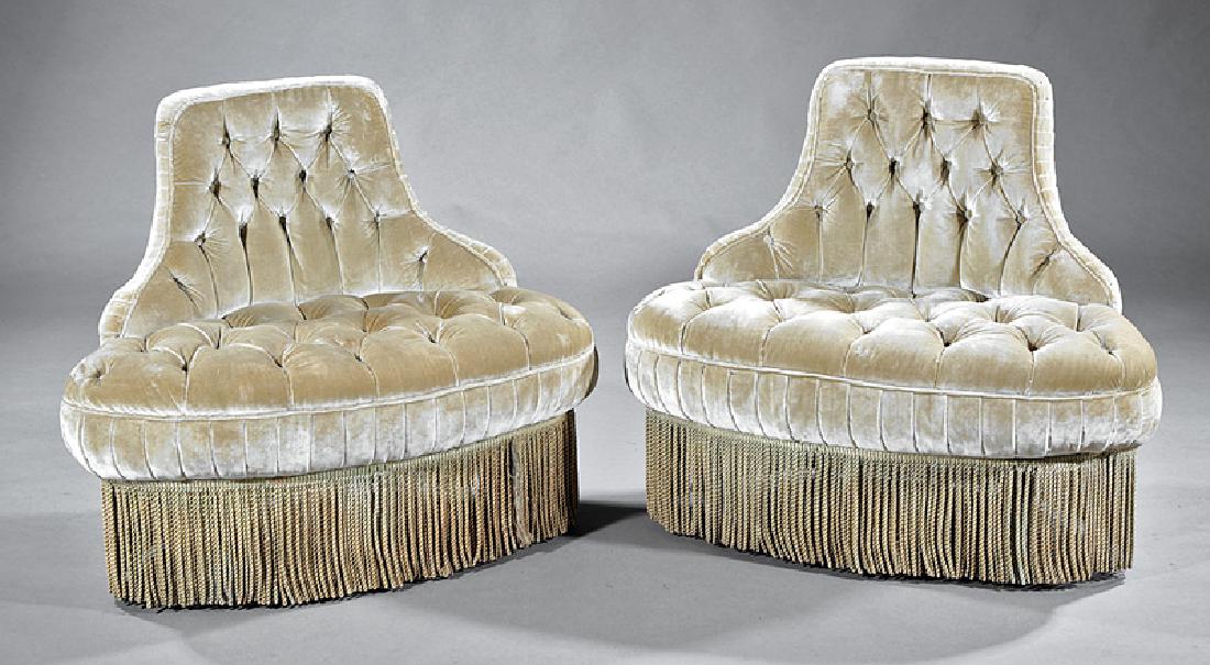 Pair of Hollywood Regency Corner Chairs: Pair of Hollywood Regency Corner Chairs, button tufted back and seat, fringe skirt, h. 30 1/2 in., w. 36 in., d. 23 in. Provenance: Collection of Nan Wier, New Orleans, LA