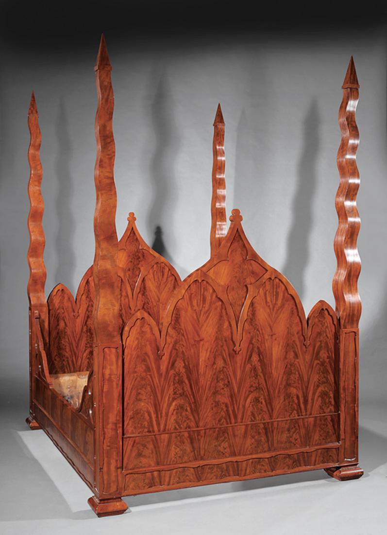 American Gothic Figured Mahogany Four-Post Bed: American Gothic Figured Mahogany Four-Post Bed, mid-19th c., probably Baltimore, undulating posts, arched headboard with trefoil crest, scrolled brackets, conforming foot board, blocked and molded fee