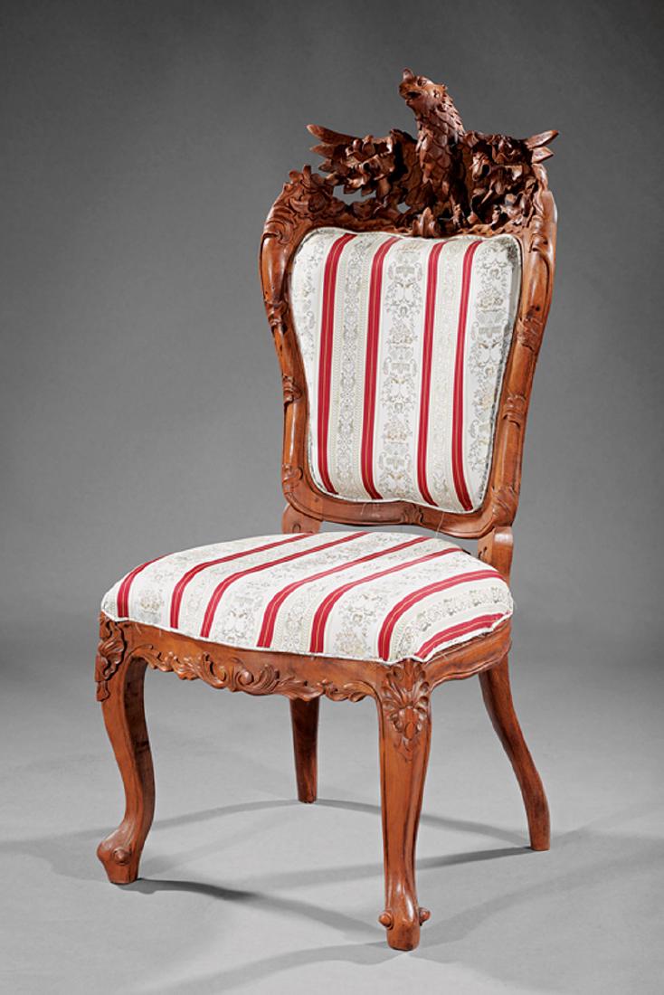American Rococo Carved Oak Side Chair: American Rococo Carved Oak Side Chair, mid-to-late 19th c., crest surmounted by spread winged eagle, foliate stiles, serpentine seat rail, anthemion carved cabriole legs, trifid feet, h. 48 in., w. 23