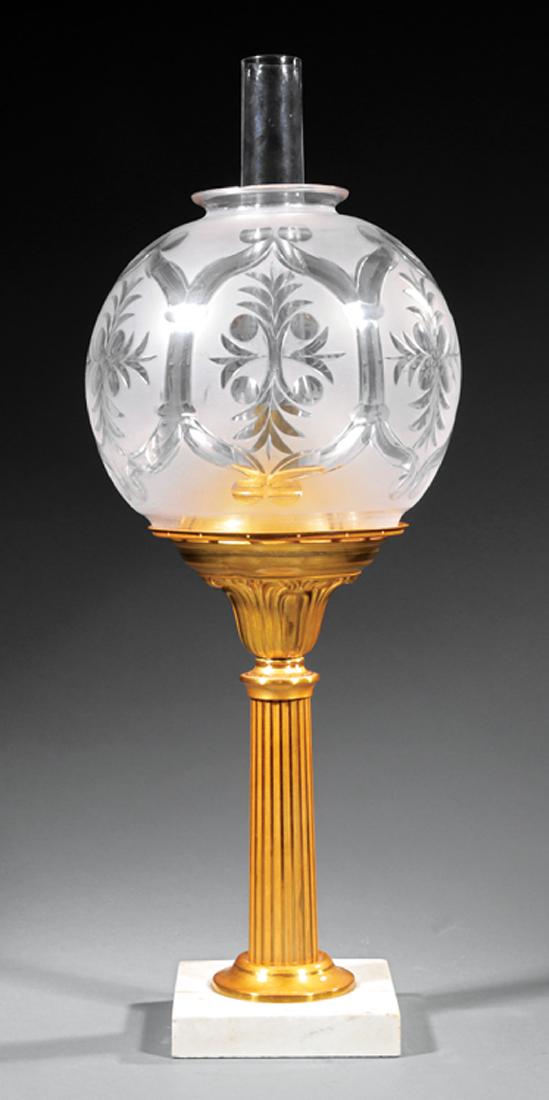 American Gilt Bronze Solar Lamp: American Gilt Bronze Solar Lamp, c. 1850, fluted column on marble base, shade cut with foliate reserves, h. 21 1/2 in. Provenance: The Service Collection, Estate of Grant A. Oakes, Warren, OH