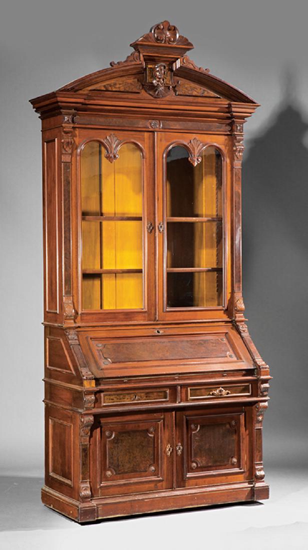 Walnut Secretary Bookcase attr. Brooks: Fine American Renaissance Carved and Burled Walnut Secretary Bookcase, mid-19th c., attr. to Thomas Brooks, New York, molded arched cornice, paneled frieze, glazed doors, fall-front writing surface, f
