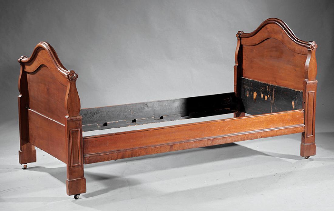 American Late Classical Walnut Daybed: American Late Classical Walnut Daybed, 19th c., arched molded head and foot board, trefoil uprights, straight rails, blocked feet, h. 41 in., w. 70 in., d. 31 1/2 in. Provenance: Austerlitz Plantation