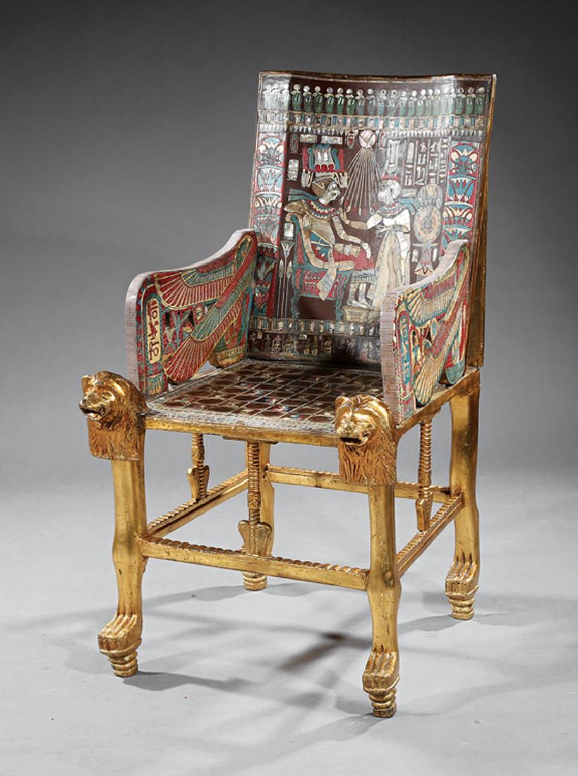 Bone and Mother-of-Pearl Inlaid Armchair: Egyptian Revival Parcel Gilt, Polychrome, Bone and Mother-of-Pearl Inlaid Armchair, early 20th c., modeled after King Tutankhamun's throne, incurvate back, winged arm supports, lion carved legs, paw f