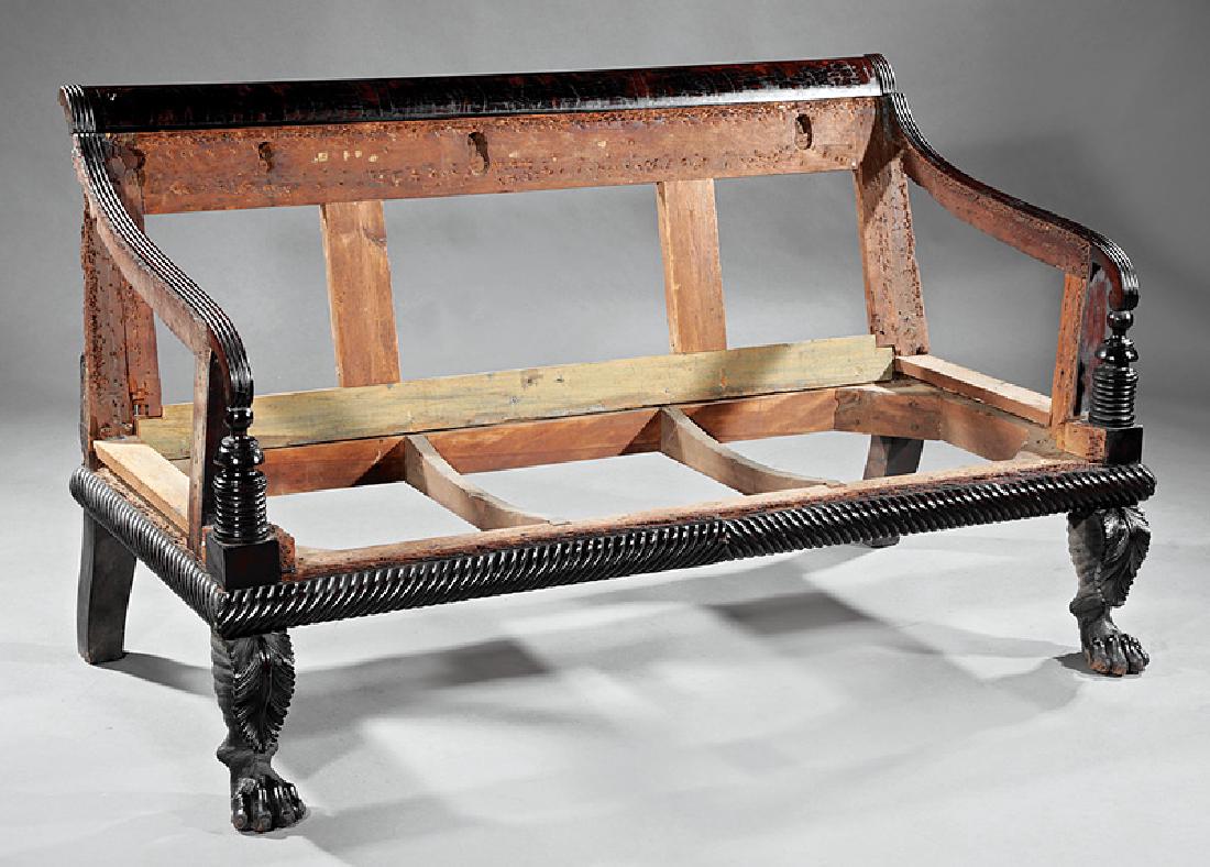 American Classical Carved Mahogany Sofa: American Classical Carved Mahogany Sofa, c. 1825, Philadelphia, crest with three figured panels, reeded arms on ring-turned supports, gadrooned seat rail, acanthus and hairy paw feet, presented "in fr
