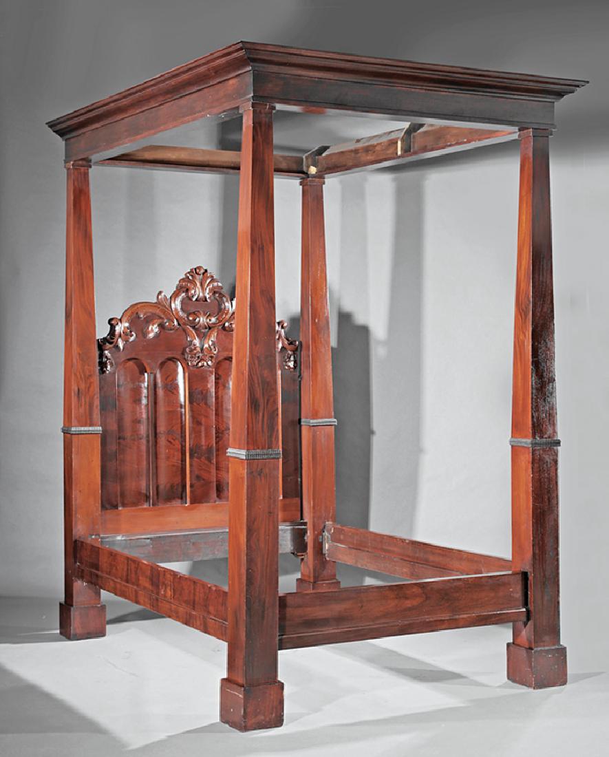 American Classical Carved Mahogany Tester Bed: American Classical Carved Mahogany Tester Bed, mid-19th c. and later, stepped molded later walnut tester, square tapered posts with bands of ripple molding, arched paneled headboard centering a foliat