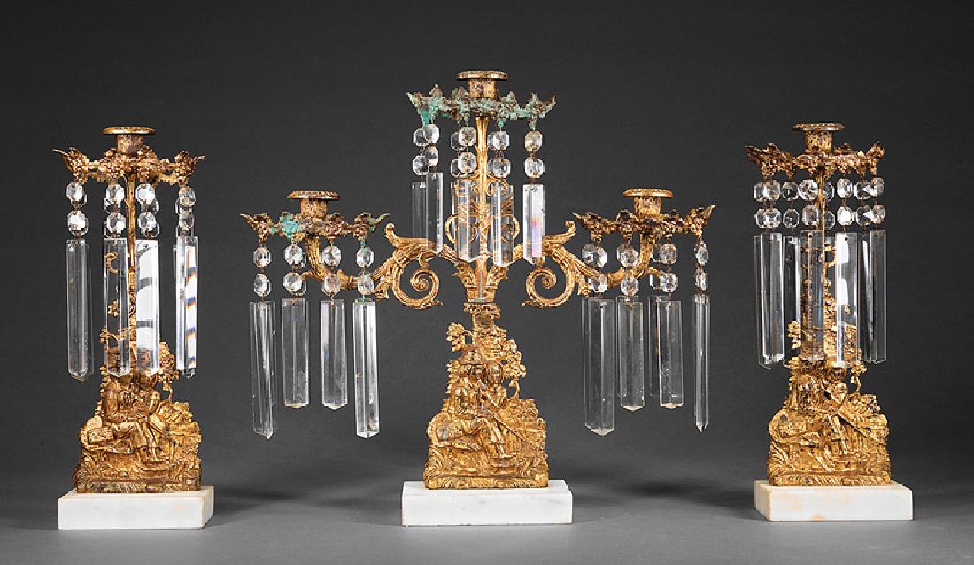 American Gilt Brass Girandole Garniture: American Gilt Brass Three-Piece Girandole Garniture, c. 1850, "Fisher Boy and Girl" pattern, grapevine prism ring, faceted prisms, marble base, three-light fixture, h. 16 in., w. 17 in., d. 14. Proven