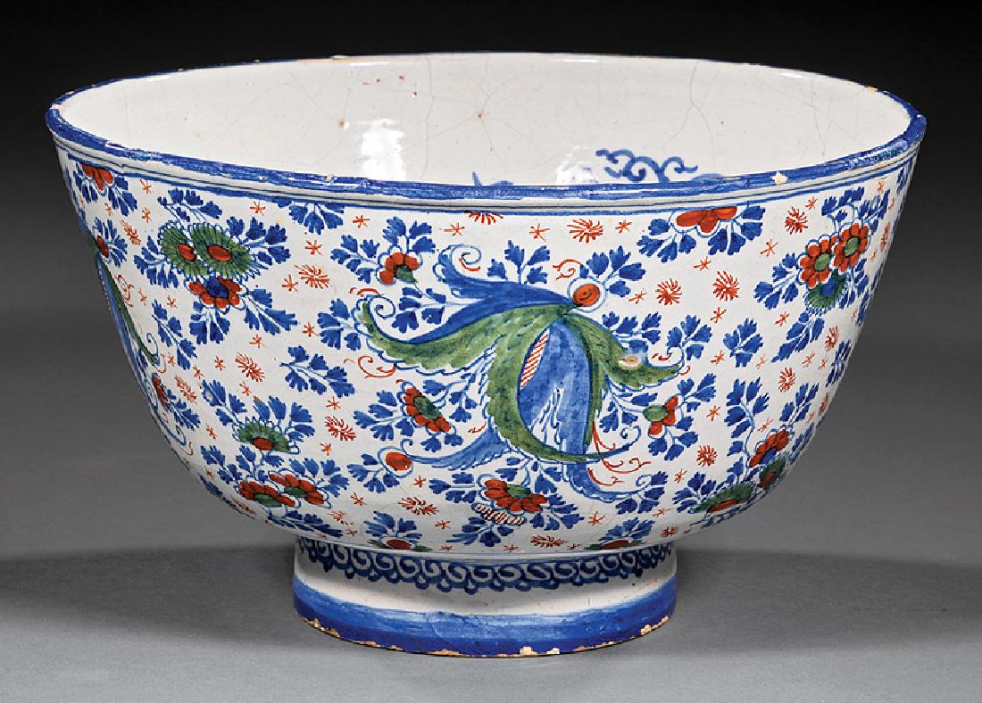 English Delftware Polychrome Bowl: Large English Delftware Polychrome Bowl, c. 1740, probably Bristol, foliate and "star" design in blue, iron-red and green, interior with foliate spray, h. 7 in., dia. 11 3/4 in. Provenance: Christie's
