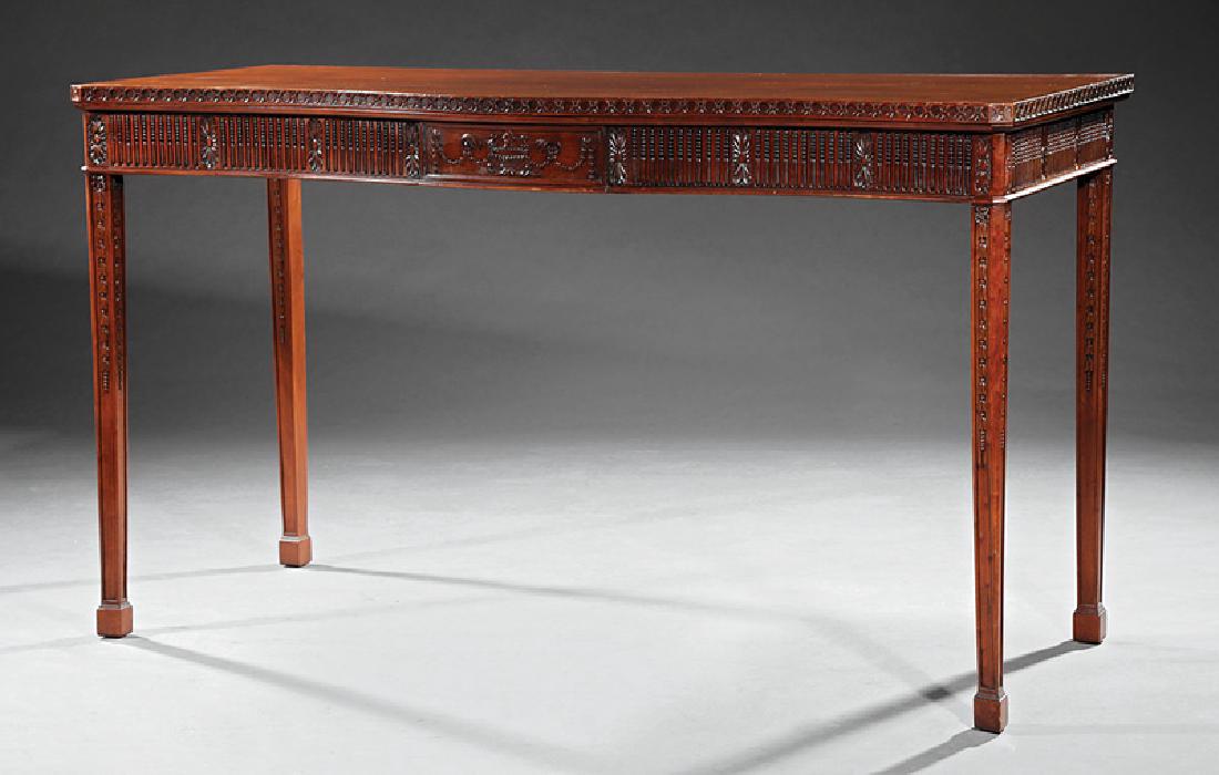 George III-Style Carved Mahogany Serving Table: George III-Style Carved Mahogany Serving Table in the Style of Robert Adam, early 20th c., serpentine top, conforming highly carved frieze, square tapered bellflower carved legs, spade feet, h. 35 7/8