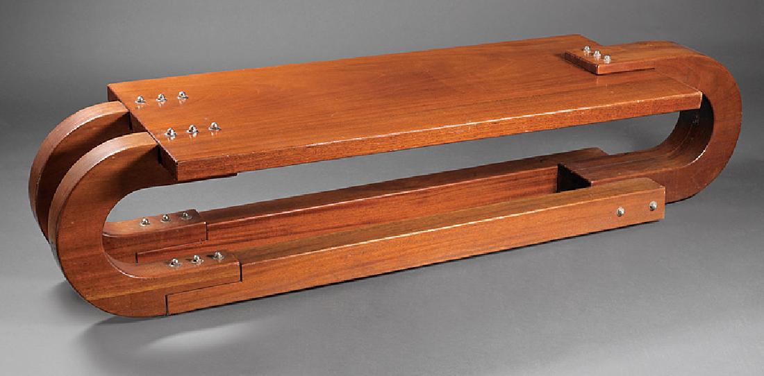 Jack Gates (American/Louisiana, b. 1946): Jack Gates (American/Louisiana, b. 1946), "Paperclip Table", mahogany and steel, unsigned, h. 16 1/2 in., w. 73 in., d. 23 in. Provenance: Collection of Michael Brown and Linda Green, New Orleans. Not