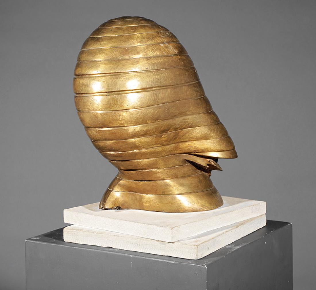 Robert Wick (American/Arizona, 20th c.): Robert Wick (American/Arizona, 20th c.), "Golden Head", cast bronze on stone base, unsigned, h. 16 in., w. 14 in., d. 11 in., pedestal, overall h. 56 1/2 in. Provenance: Collection of Michael Brown an