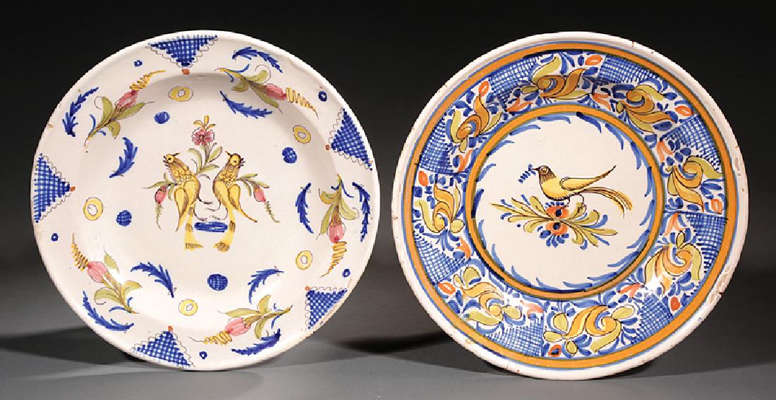 Two Tin Glazed Earthenware Chargers: Two Tin Glazed Earthenware Chargers, probably 19th c., probably Italian, polychrome decorated with birds, marked "V.M.D." and "RC", dia. 13 3/4 in. and 13 1/2 in. Provenance: The Sturm Collection