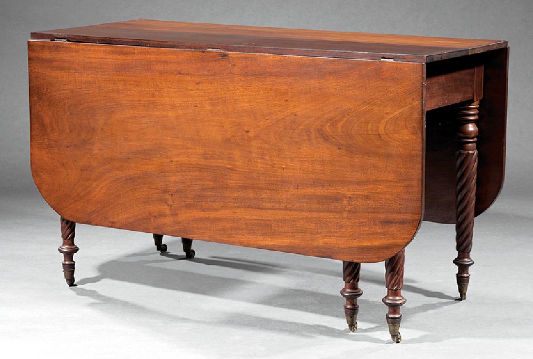 Federal Carved Mahogany Drop-Leaf Dining Table: American Federal Carved Mahogany Drop-Leaf Dining Table, early 19th c., two opposing frieze drawers, rope-turned legs, two swing legs, casters, h. 28 3/4 in., w. (open) 60 in., w. (closed) 21 1/2 in.,