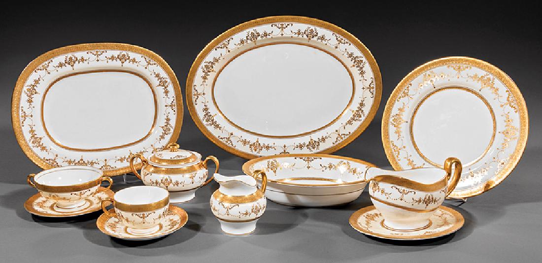 Minton Gilt Porcelain Partial Dinner Service: Minton "Riverton" Pattern Gilt Porcelain Partial Dinner Service, c. 1926-2011, marked, raised gilt floral border incl. 12 dinner plates, dia. 10 3/4 in., 12 salad plates, dia. 7 3/4 in., 10 bread plat